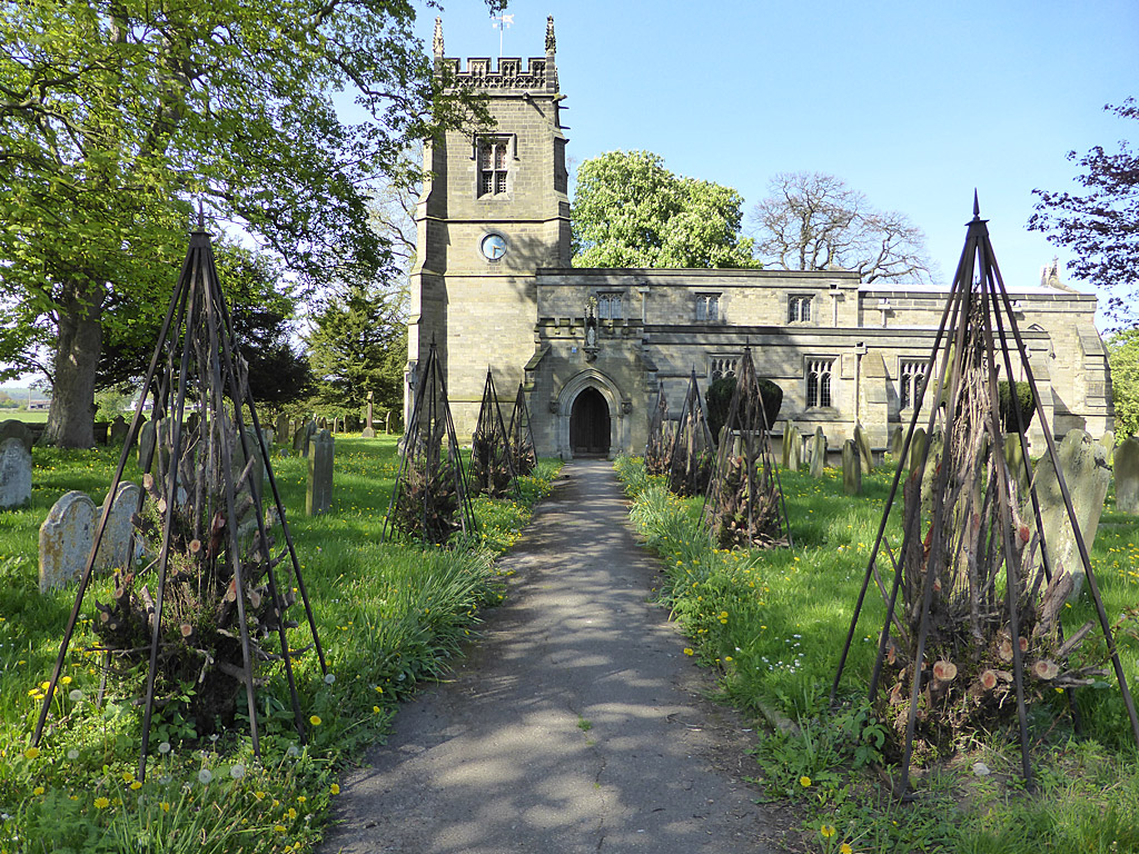 Slingsby Church with the new metal tree pyramids in place